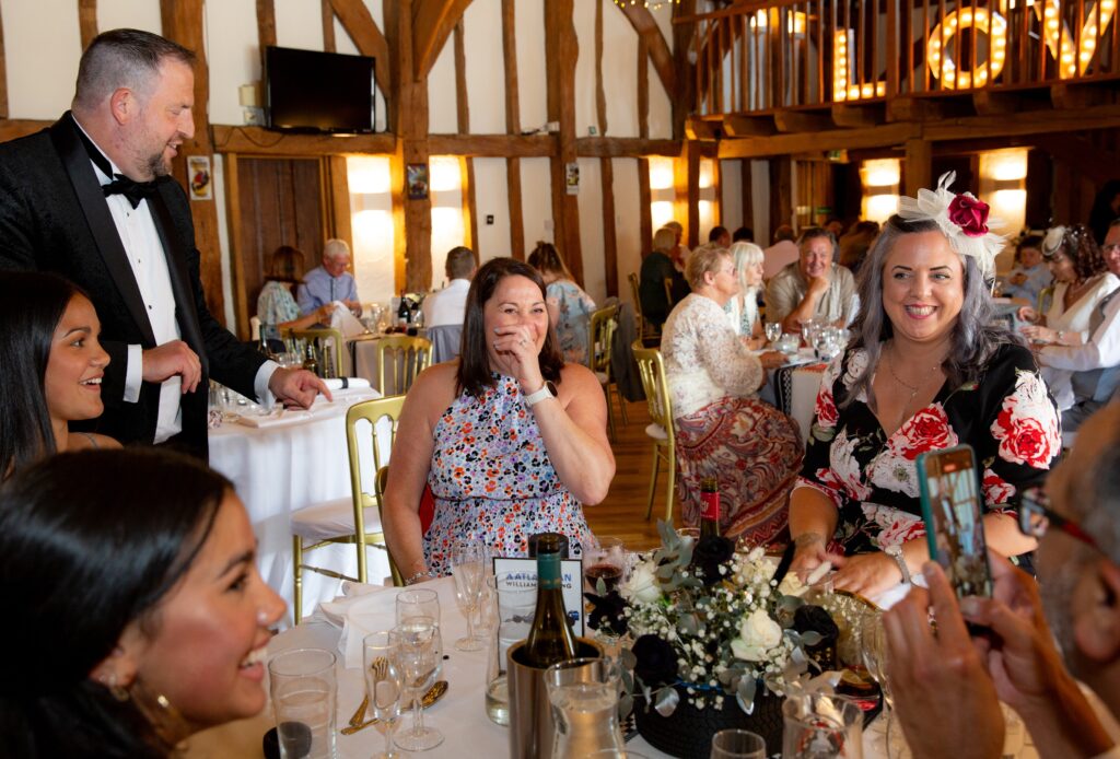 Jason entertaining at wedding with magic